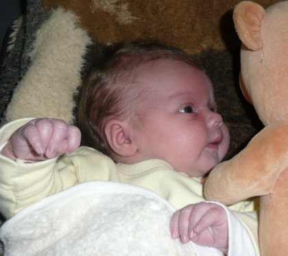 Baby mit Teddy